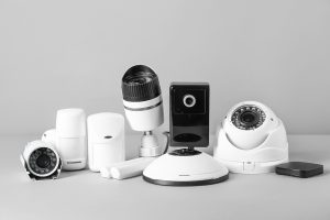 Different equipment of security system on grey background