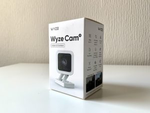 The Wyze Cam V3 packaging. The box placed on a white table.