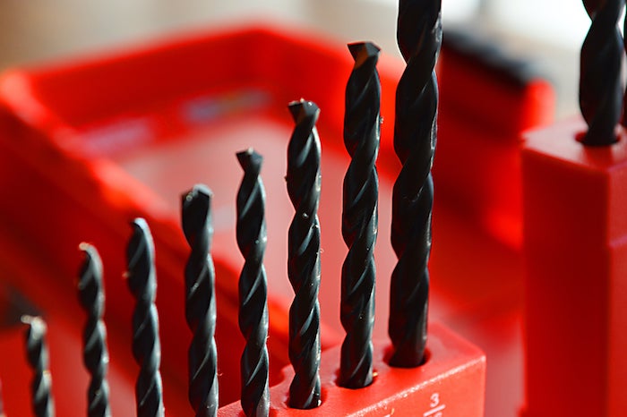 Different types of drill bit lined up in a set