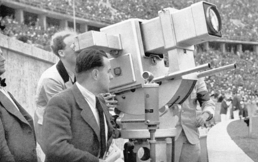 Walter Bruch operating his Oympia-Kanone camera at the Berlin Olympics, 1936.