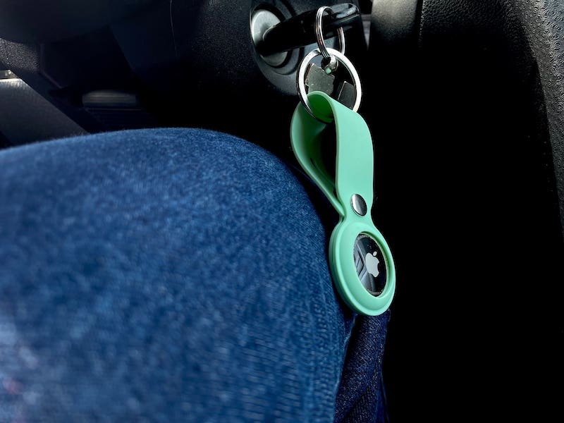 AirTag attached to car keys in the ignition