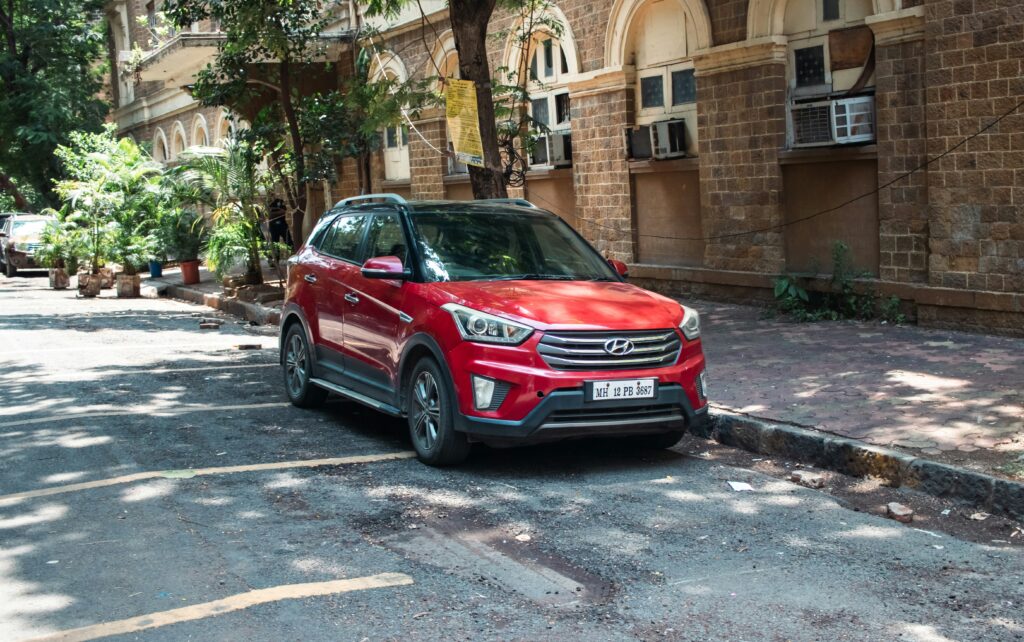 red car parked on the street