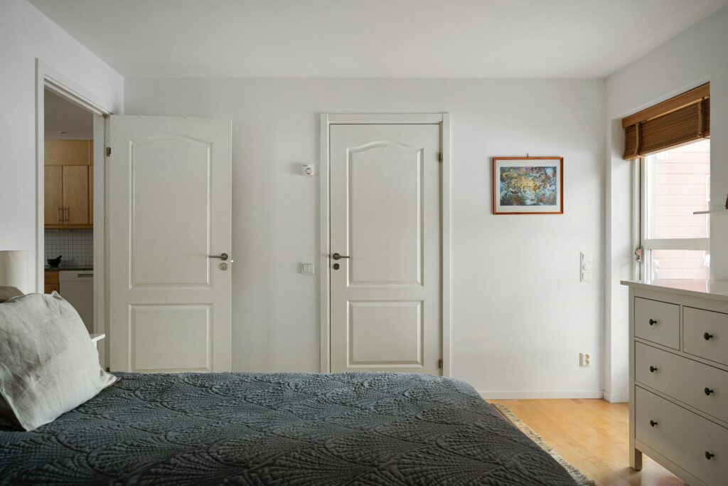 bedroom with 2 doors