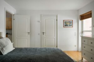 bedroom with 2 doors